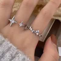 New open four-pointed star zircon ring