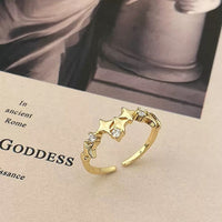 New open four-pointed star zircon ring