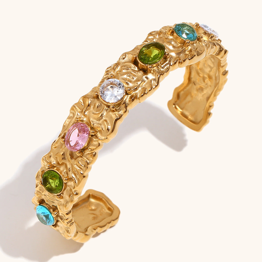 Irregular colored diamond stainless steel bracelet ring earrings plated with 18K gold.