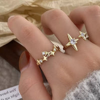 New open four-pointed star zircon ring