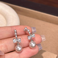 S925 silver needle manta rose pearl bow pendant earrings