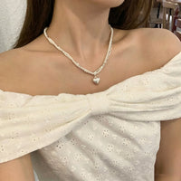 “Kiss of Time” Double Layer Heart Pendant Necklace