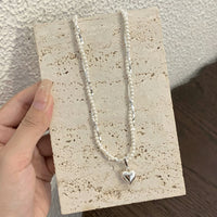 “Kiss of Time” Double Layer Heart Pendant Necklace
