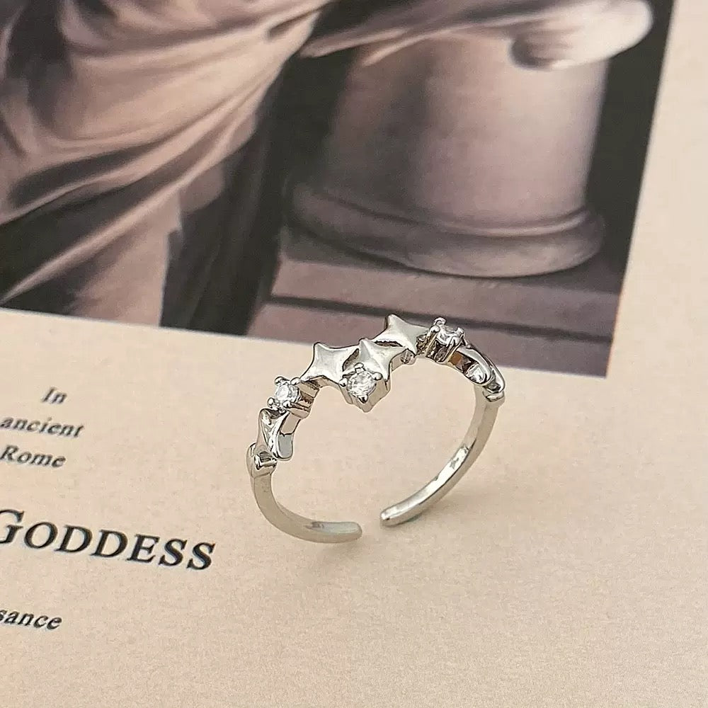 New open four-pointed star zircon ring