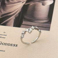 New open four-pointed star zircon ring