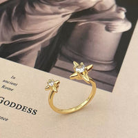 New open four-pointed star zircon ring