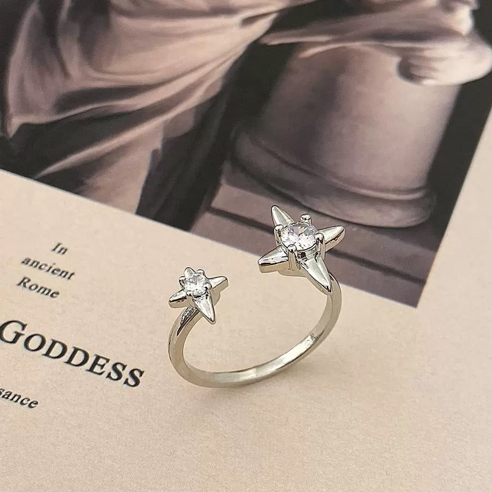 New open four-pointed star zircon ring