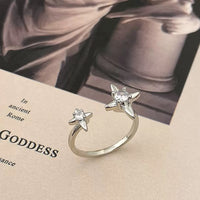 New open four-pointed star zircon ring