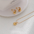 Emerald zircon necklace sand gold earrings